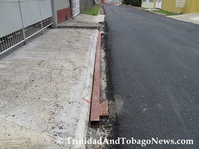 A length of 4 x 4 inch steel was placed in the deep slipper drain to help get in and out of this driveway.