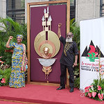 Photo: ESC director of regional and African affairs Khafra Kambon (right) poses with the Emancipation monument.