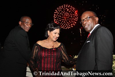 Minister of Arts and Multiculturalism Winston 'Gypsy' Peters, Prime Minister Kamla Persad-Bissessar and Minister of Works and Transport Jack Warner on the Hilton rooftop observing Independence Day fireworks