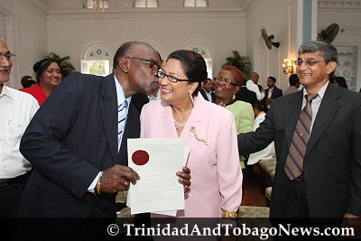 UNC Chairman and Chief Whip Jack Warner congratulates New Opposition Leader Kamla Persad-Bissessar