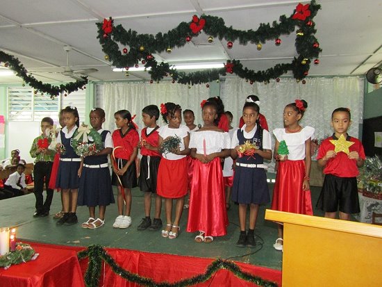 The Twelve Symbols of Xmas displayed by students with the Star of David at right