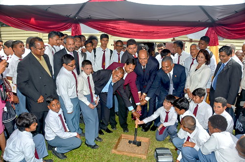 Minister of Education Tim Gopeesingh turning the sod to start $15m expansion at Hillview