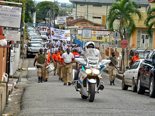 Marchers on Cochrane Street, Tunapuna