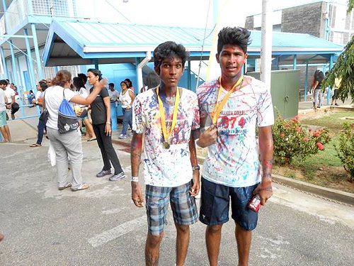 Two Students with their Medals