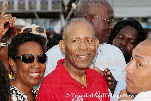 M.P. for San Fernando East and former Prime Minister Patrick Manning and his wife Hazel Manning walking through the Calypso Fiesta 2013 crowd