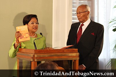 Kamla Persad-Bissessar is sworn in as the first female Prime Minister of Trinidad and Tobago
