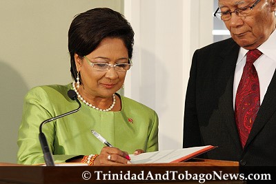 Kamla Persad-Bissessar is sworn in as the first female Prime Minister of Trinidad and Tobago