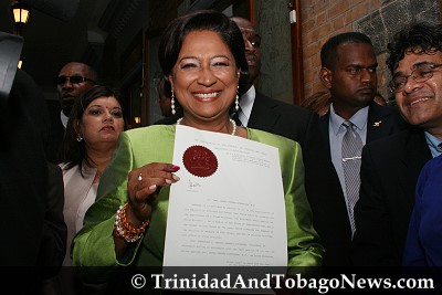 Kamla Persad-Bissessar is sworn in as the first female Prime Minister of Trinidad and Tobago