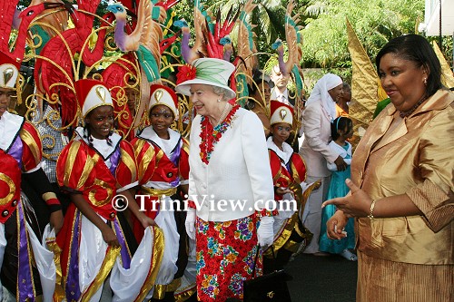 Queen Elizabeth II greets children at Queen's Hall